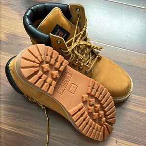 Timberland Tan and Black High-Top Boots with Aggressive Tread